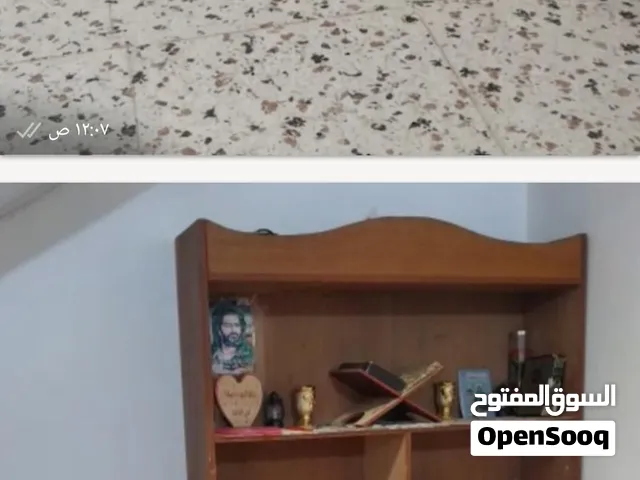 معرض كتب خشبي بتصميم راقي وشغل نجارة متقن