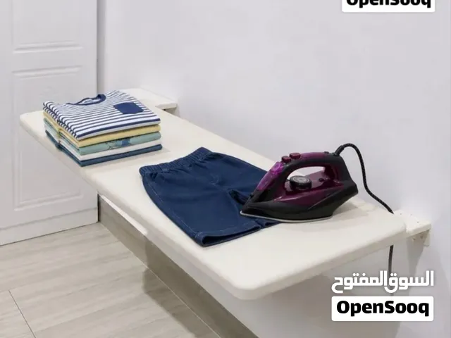 طاولة كوي ملابس جدارية قابلة للطي توفر المساحة وتريحك من الفوضى، عملية وأنيقة لكل بيت في عمان ومريحة