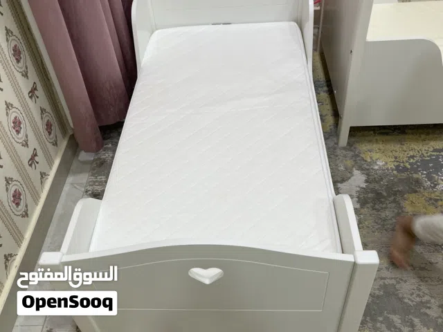 Two kids bed with mattress and two side it’s new from home center