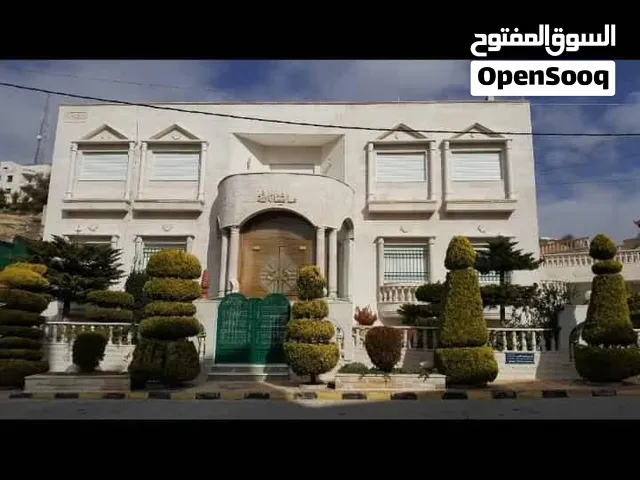 منزل للبيع في تلاع العلي الحي الشمالي مكون من طابقين وتسويه(4شقق)