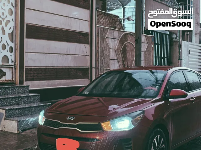 كيا ريو فئة S ((حرة ))سعرها 110$ رقم بصرة انكليزي باسمي التحويل بعقد مروري شرط البيع