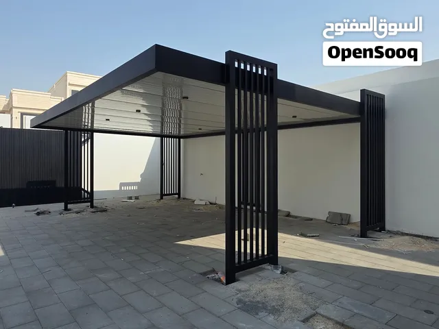 تركيب مظلات سيارات وبناء ملاحق ومجالس