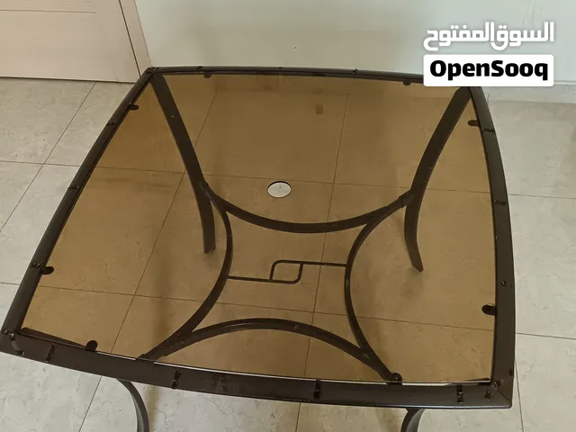 Glass top table for sale at 4 omr