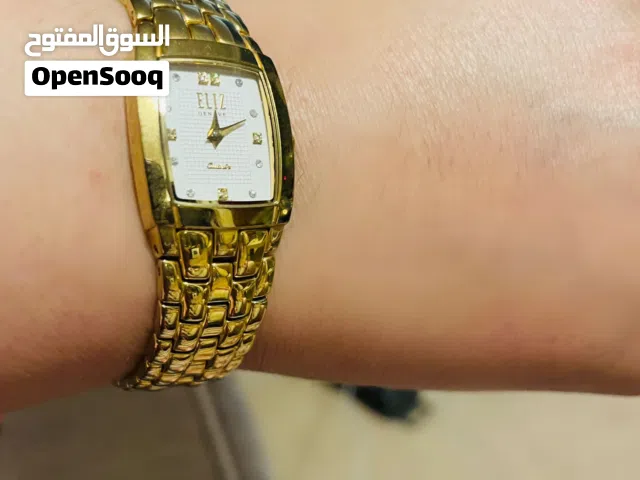 ساعة إليز سويسرية جديدة مطلية ذهب بفصوص داخلية ألماظ