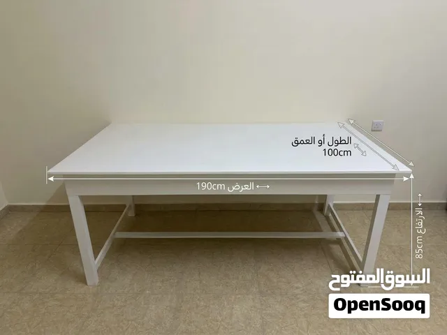 طاولة لكيّ الملابس