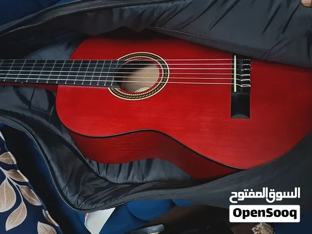 للبيع جيتار مع الكيس السعر 23 دينار