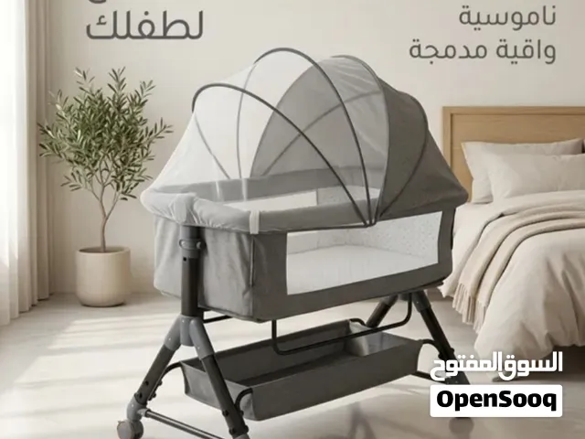 مهد أطفال مريح وعملي مع ناموسية وعجلات - توصيل مجاني