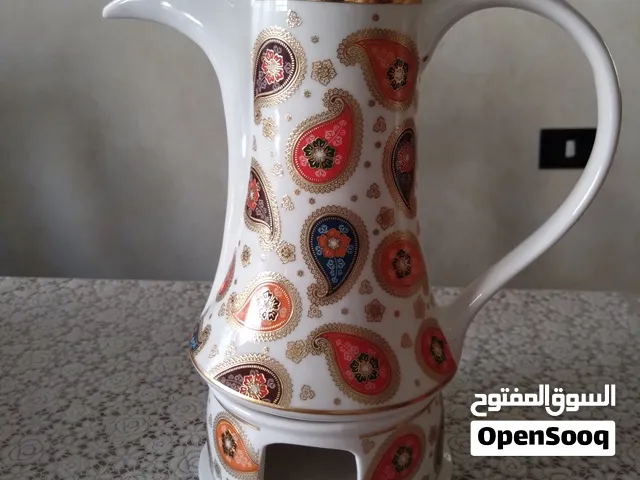 دلة بورسلان مع قاعدة للتسخين