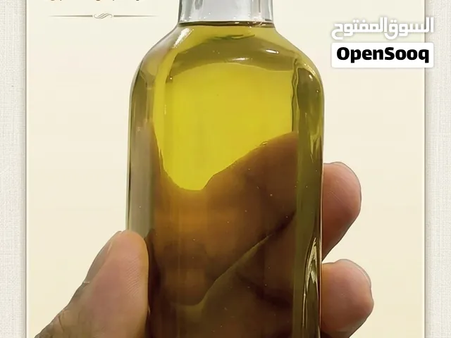 زيت اللبان الذكر العماني مستخلص في زيت زيتون أصلي مقروء فيه القرآن الكريم كاملا
