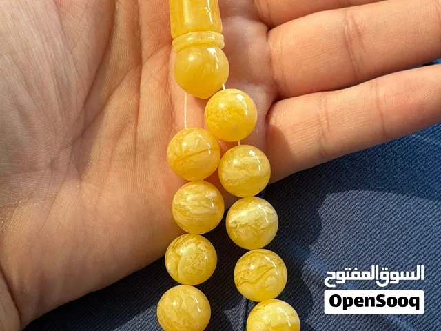 كهرمان مشخص 88 غرام 14 14 ونص 57 خرزة