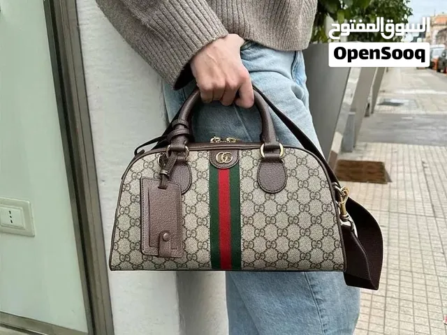 شنطة Gucci فاخرة بجودة عالية - بيج وبني