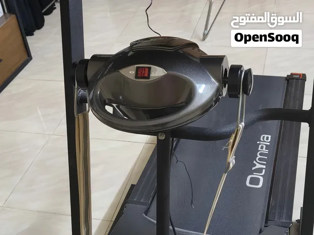 جهاز سير رياضي مع جهاز رجاج و قواعد لحركات رباصية ثانية حجم الجهاز كبير شبه الجديد