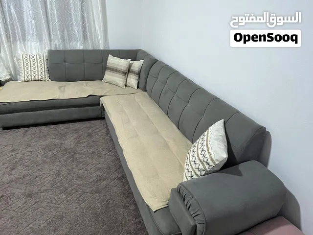 طقم كنب كورنر رمادي مستعمل للبيع – عجلون
