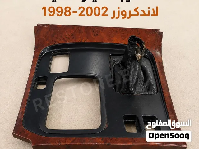 تخشيبة قير تيوتا لاندكروزر 1998–2002 أصلية  Toyota LC100 Gear Trim OEM
