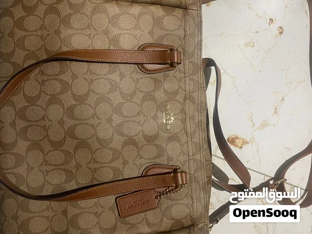 coach signature bag