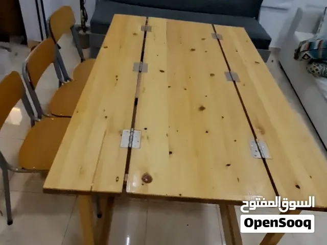 Dining table + 3 chairs  only 15 BD