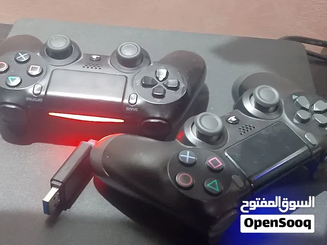 ps4 slim flashé 500gb 2 manette , les game li bghiti nxarjihom+usb 64gb jduda bouskoura