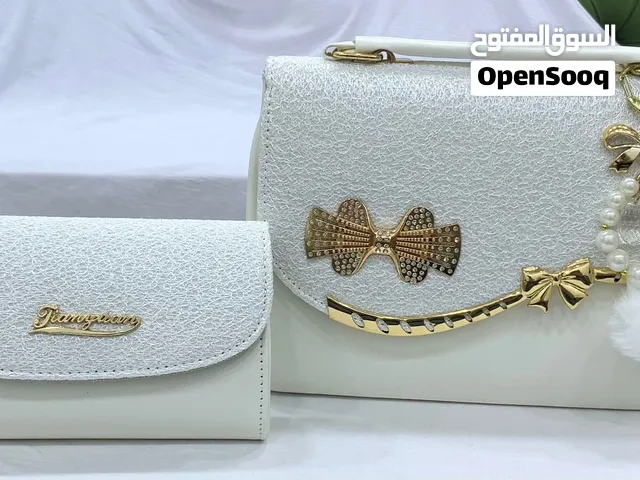 طقم حقائب نسائية فخم قطعتين    طقم جنط نسائية قطعتين مع محفظة وإكسسوارات