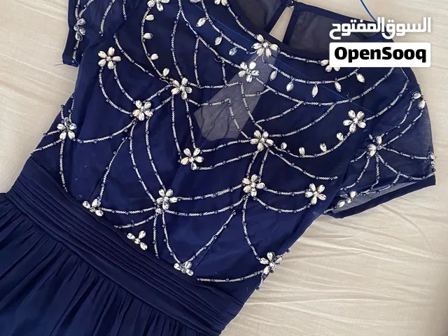 فستان ازرق فخم للسهرة ناعم ورقيق قياس XS/S جديد غير مستخدم