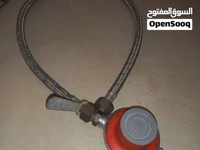 منظم غاز مع خرطوم