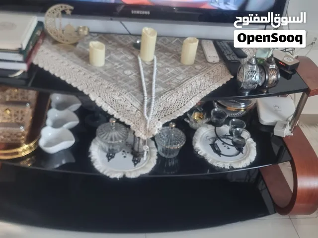 طاولة تلفزيون خشب مع زجاج