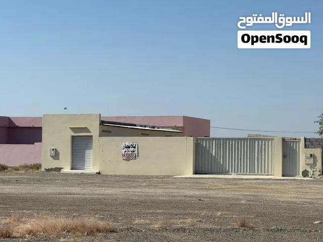 أرض صناعية في صحم وتصلح مصنع صغير أو مخزن أو كراج أو سكراب أو محل مواد بناء كبير مساحتها 1000 متر