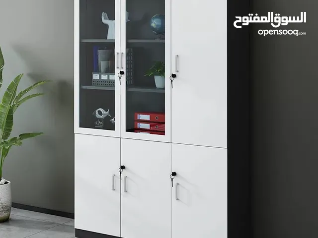 This is a modern office storage cabinet with glass doors and adjustable shelves.