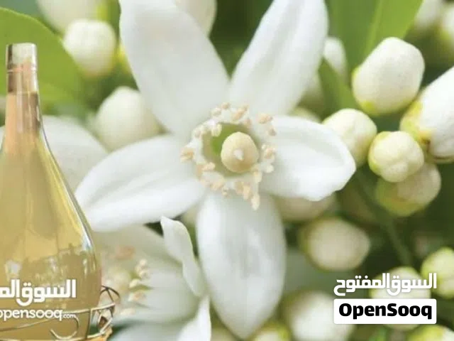 ماء زهر مقطر بزيته للبيع.