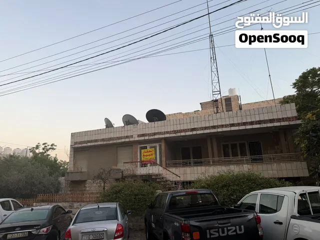 فرصة استثمارية مميزة – أرض للبيع مع منزل قائم في العبدلي