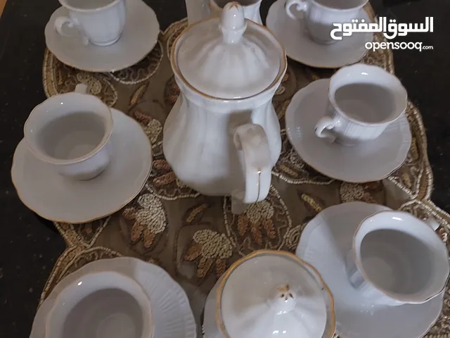 طاقم فناجين قهوه وطاقم نسكافيه.