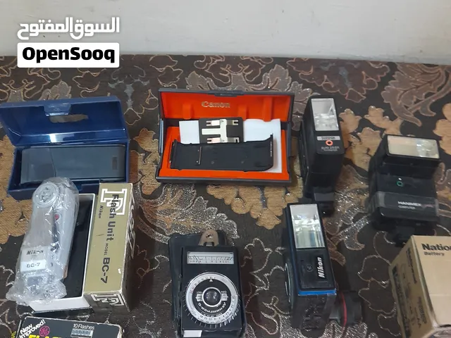 مجموعة مميزة من ملحقات واكسسوارات الكاميرات القديمة للبيع بشكل كامل