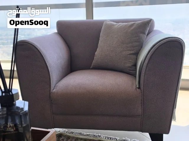 Gray arm chair in very good condition. Price negotiable.