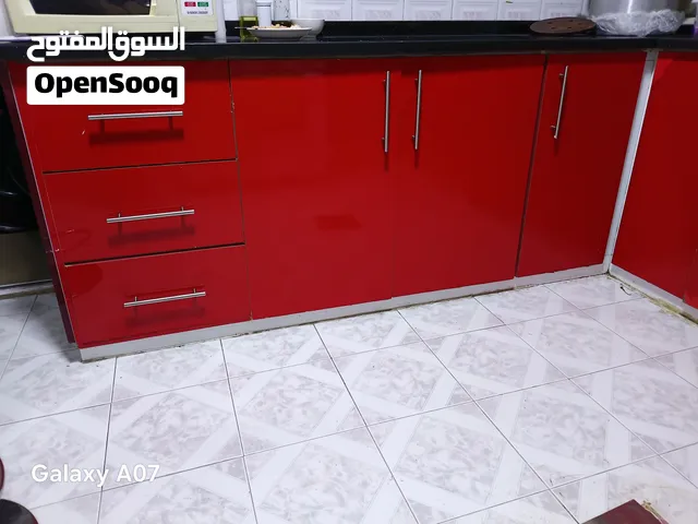 ظرفات مطبخ احمر خشب