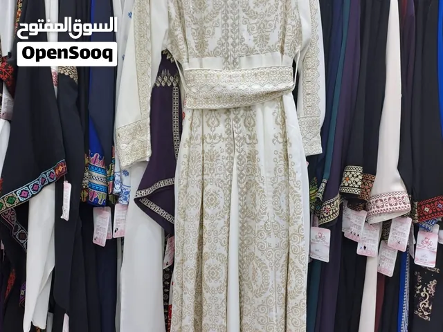 فستان جديد من محل ركن الهدي