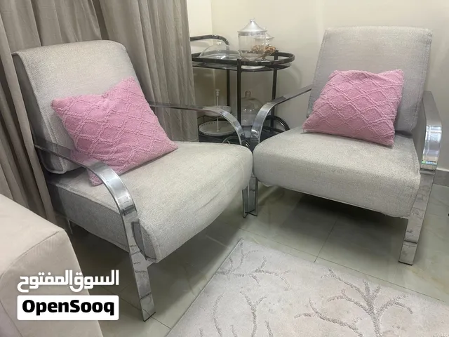 2 stainless steel chairs