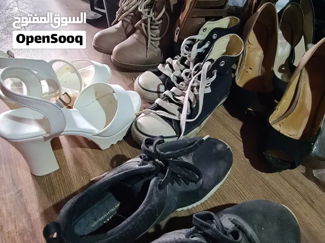 Buy from a set of women's sports or formal shoes (Adidas, Spring and other brands)