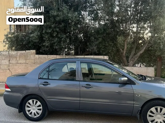 mitsubishi lancer glx 1600cc 2010اصلي