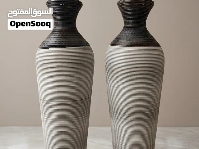 مزهرية مستعمله من الصين  موديل عصري و حديث و الحجم وسط لا كبير ولا صغير