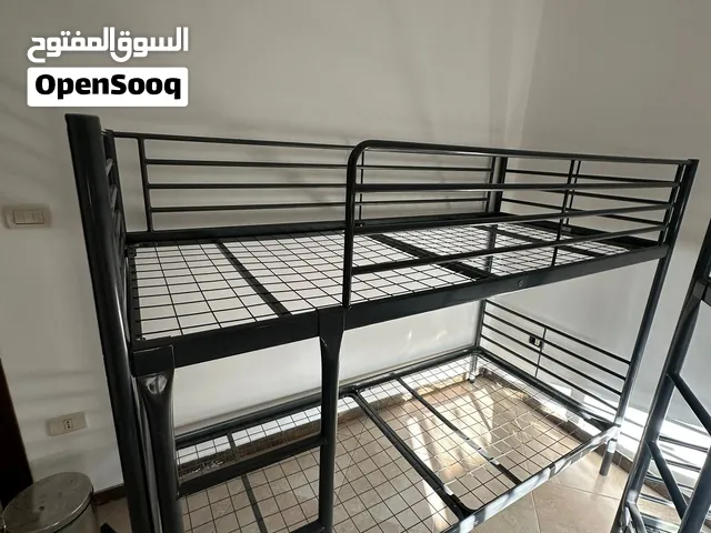 أسرة أطفال طابقين