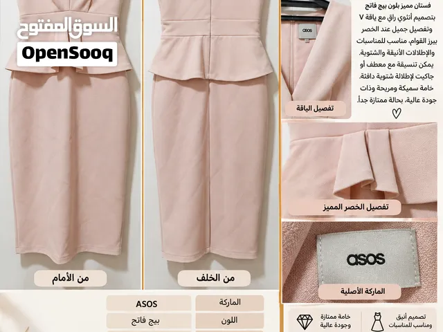 فستان بلون وردي فاتح بتصميم مرتبS/M يتميز بقصة ياقة V وتفصيل جميل عند الخصر مع طبقة واسعةASOS