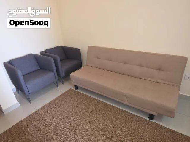 Moving Out Sale: 9-Month-Old Sofa Bed, IKEA Armchairs & Rug (Like New)