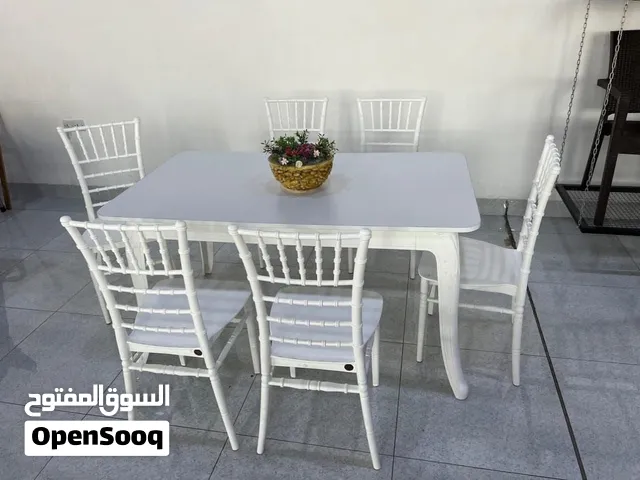 ميز طعام عضم عاج فقط بدون كراسي