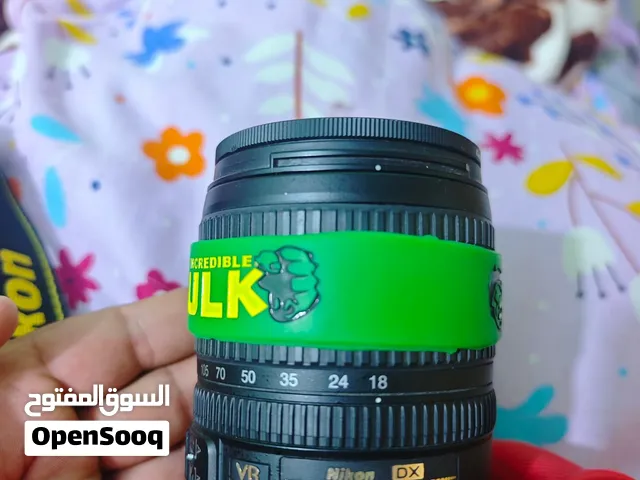 نيكون 7100 عدسة 105 / 18 رام الاصلي 32 جلاتبن احمر جنطة شاحنه بطارية حزام كتف