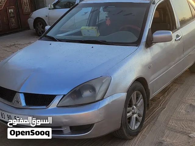 متشي لانسر 2010 محرك 18 سياره الله يبارك محرك كمبيو وهيكل ممتاز وصاله نص عمر إطارات80فالميه