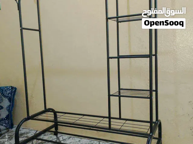 علاقة ملابس من حديد ممتاز لتنظيم ملابسك بسهولة