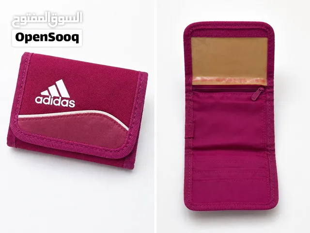 محفظة Adidas أصلية لون بنفسجي – بحالة جيدة جداً