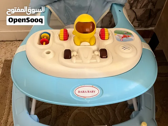 مشاية أطفال 8 عجال  (درّاجة) و (هزاز) لون أزرق ممتازة وبحالة ممتازة للبيع