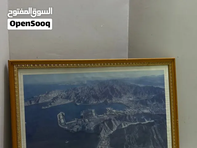 لوحة فنية تظهر ميناء السلطان قابوس