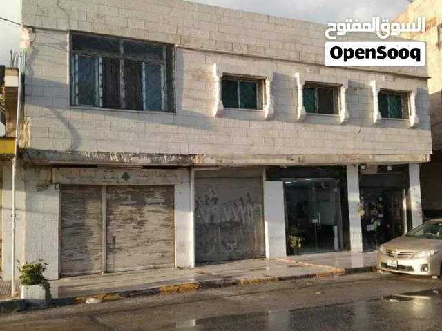 مبنى عقاري موقع مميز للبيع