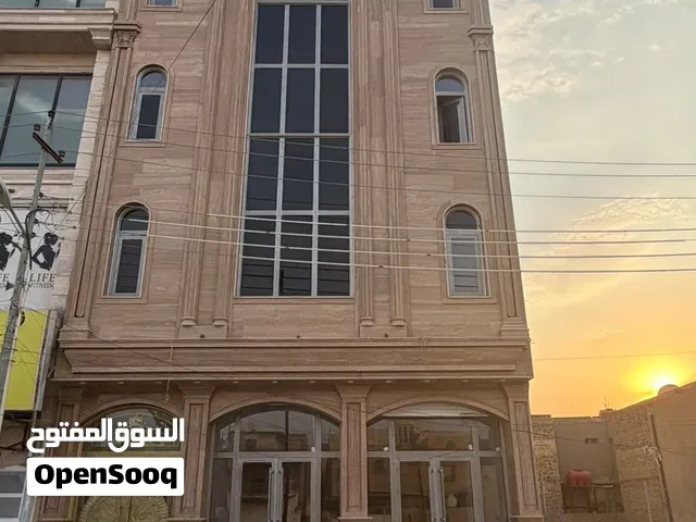 بناية تجاريه اربع طوابق